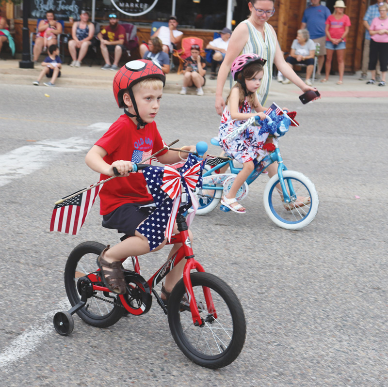 kids on bikes in parade