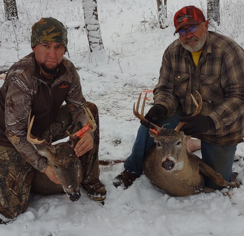 Quentin and Darryl Johnson with deer