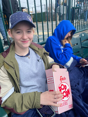 Middle school kids at baseball game
