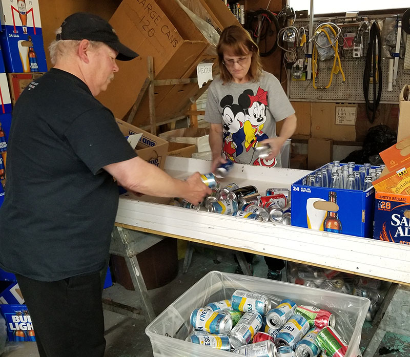 sorting cans for fireworks donations
