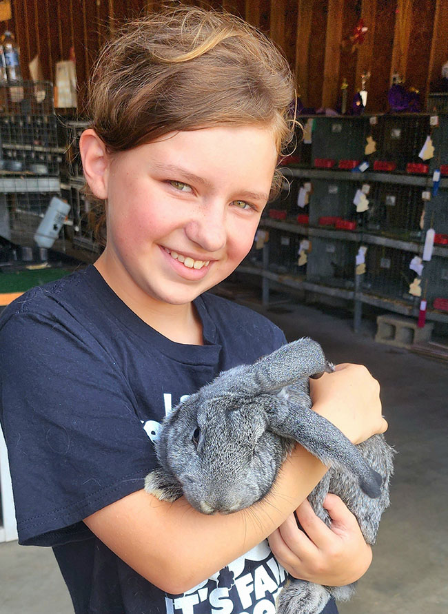 holding a rabbit