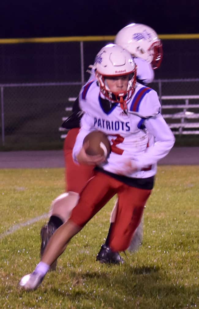 Tiernan Hinmon running with football