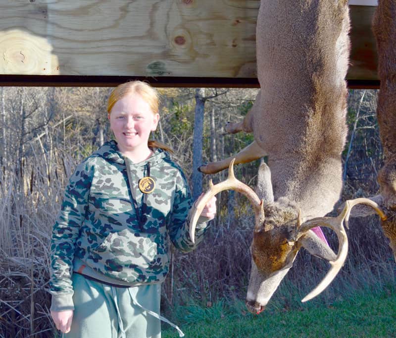 Oriana Schneider with buck