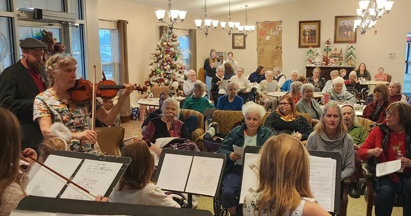violin group while residents