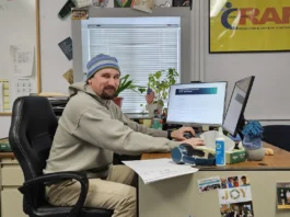 Jory Klumpp sitting at his desk