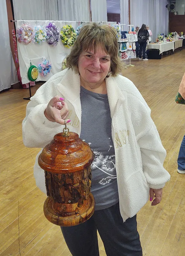 Jackie Moore with bird feeder