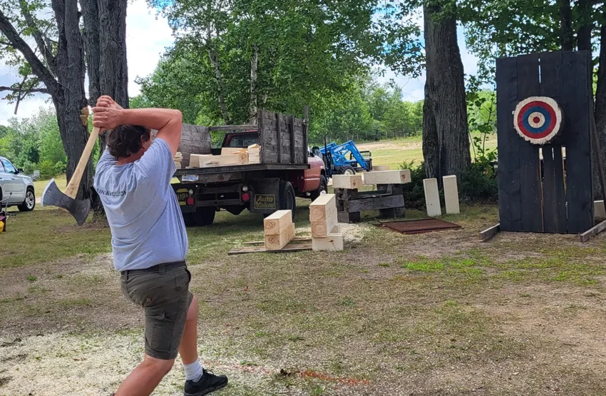 Robert trying his throw in the axe throwing