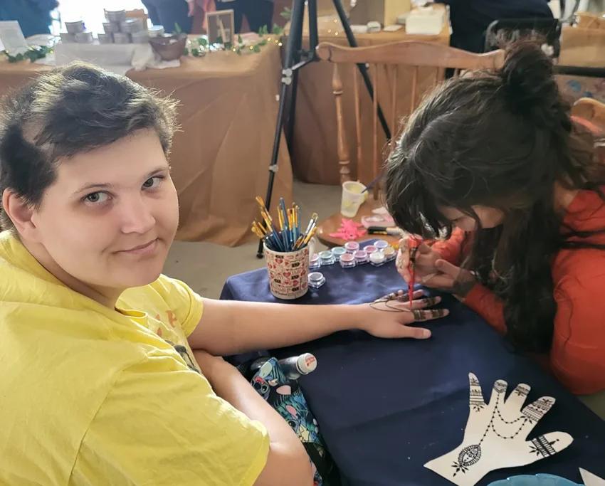 Kaleigh Ferris getting a henna design