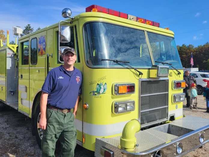 dragon slayer firetruck Chief Kevin Marino of the Tri-Town Fire Department (TTFD) in front of the