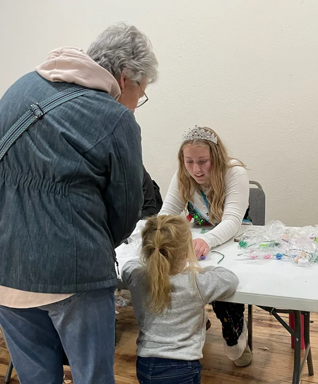 Cookies, cocoa, and crafts with Miss AuSable Riverfest ladies.