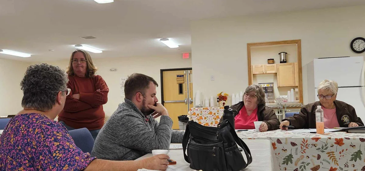 Laura Halsey of Needful things speaking about the project with Sandy Egbers, Joe Moore, Mary Stone, and Nancy Shmitz.