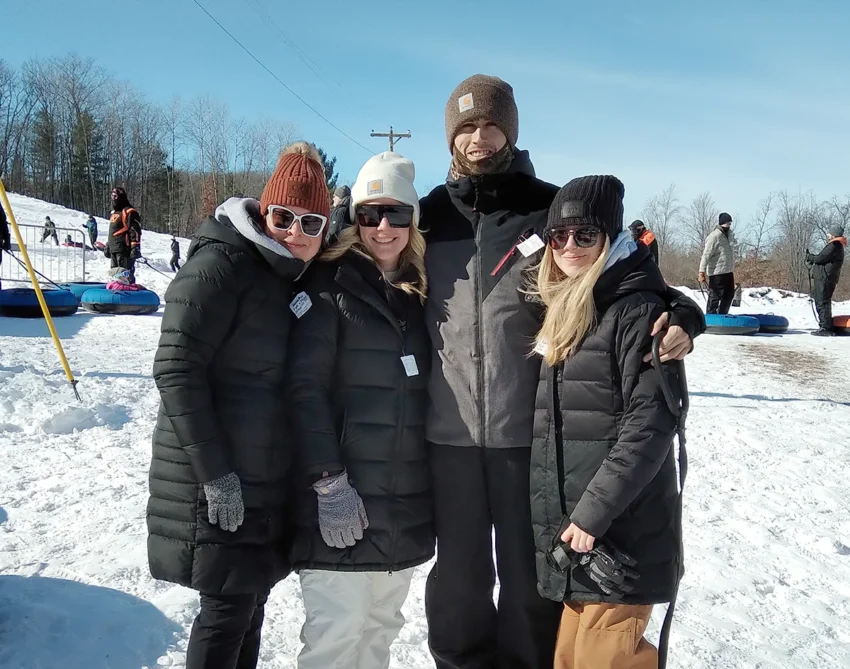 Heather Tater, Taylor Hayes, Kyle Godfrey, and Erica Karaba tubbing at Blizzardfest.