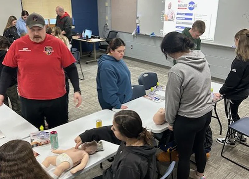 teens learning life saving skills