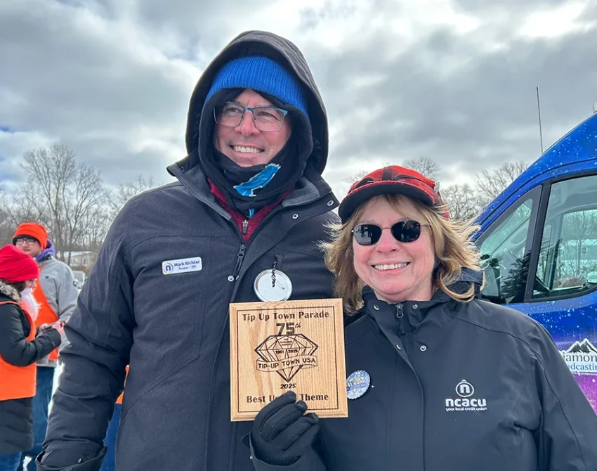 Mark Richter and Sandy Napierski claim the prize for Best of Theme for NCACU’s Float “A Charming Tradition for 75 years!”