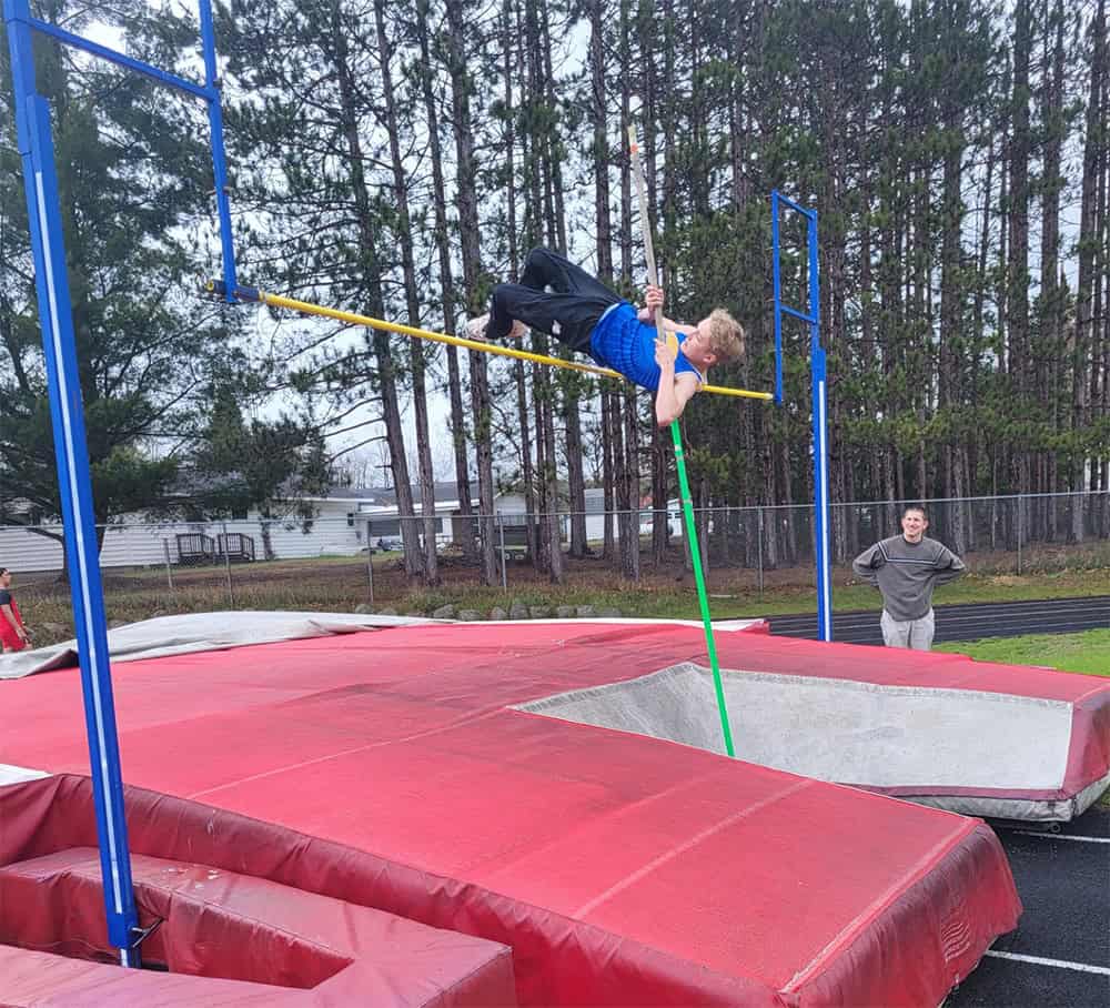 Mio sophomore Hunter Dilks pole vaulting.