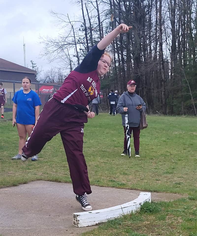 AuGres freshman Zita Lutz throwing shot put.