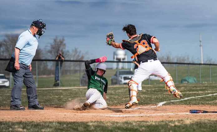 pic 19 Corbin Allen of Grayling sliding into home and gaining a run for the Vikings!