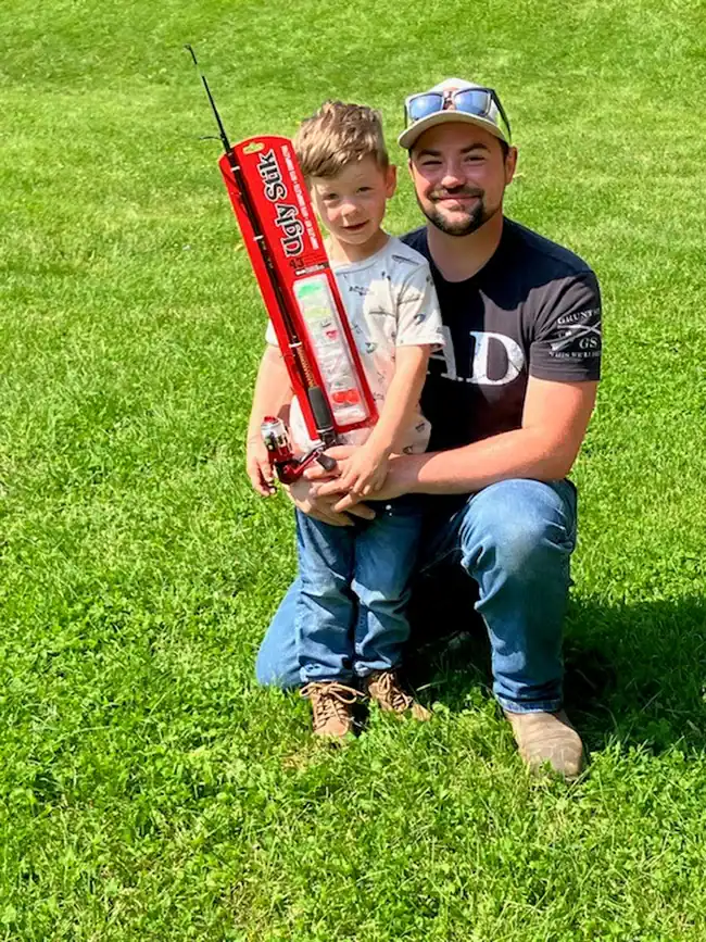 The biggest catch of the day was by 4-year-old Emery Culhane, shown here with his dad. A whopping 13 ¾ inch trout! Emery is holding his new fishing pole, prize for biggest catch of the day.