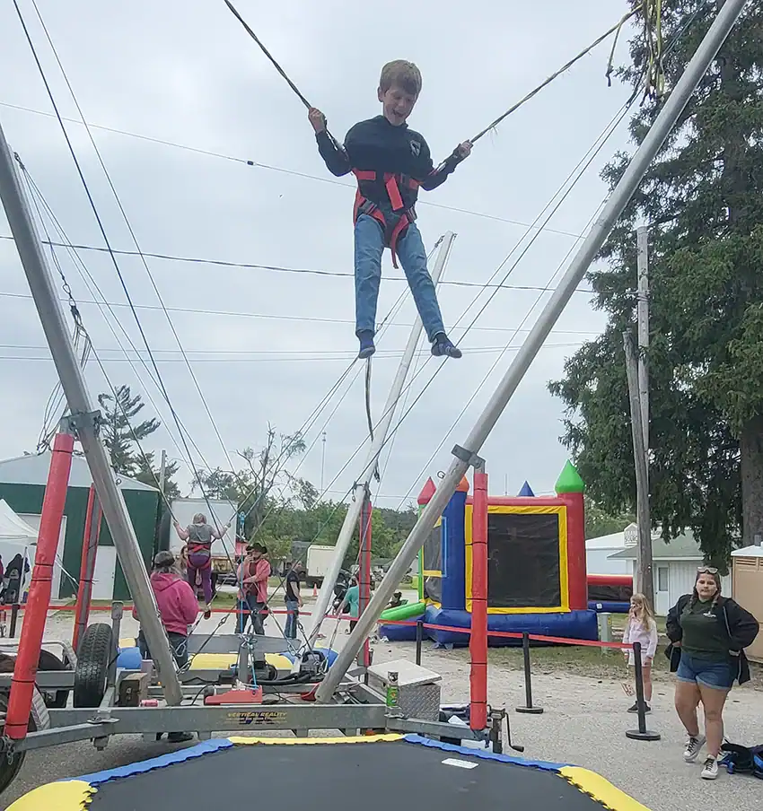 Brantley Ellis (8) of Mio had lots of fun flipping and bouncing on the trampoline.