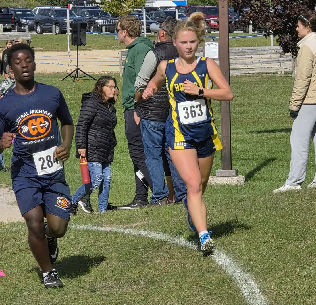 Mirabelle Balcom (10th) running for Roscommon’s Cross Country team. Mirabell has had a passion for running since 6th grade!