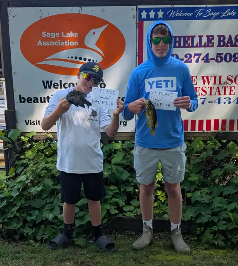 Weston Ockerman (left) won first prize for Smallest Panfish with a .48-pound Bluegill. Nolan Beaver won second for the Largest Panfish with a .72-pound Rock Bass.