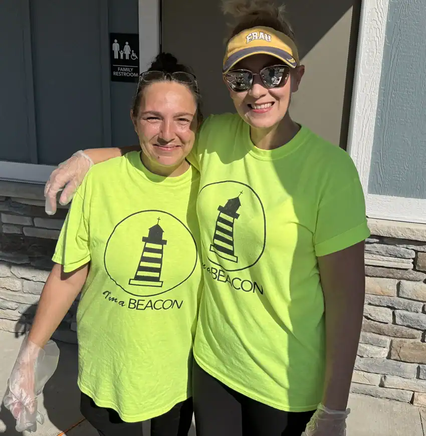 Patricia Densinger and Angel Shory prepped food and donates for Beacon Assembly of God Church.