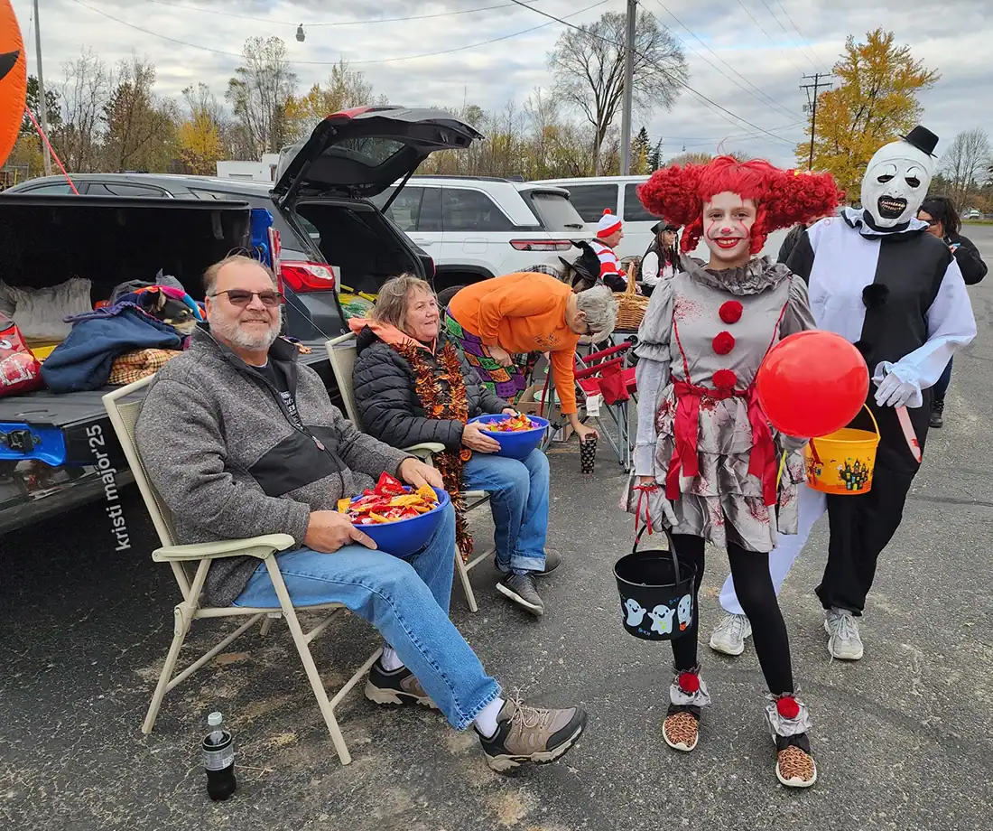 Long Lake residents Scott and Jennifer Henson had a front row seat for all the great costumes!