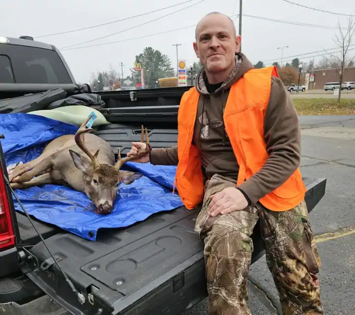 John Kelsey of Saginaw elated with his 9- point weighing in at 146 lbs.