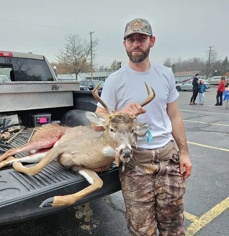 Patrick Destefanis brought in the first buck to the pole held at Fred's Restaurant in Roscommon. Destefanis' 4-point buck weighed 108 lbs.