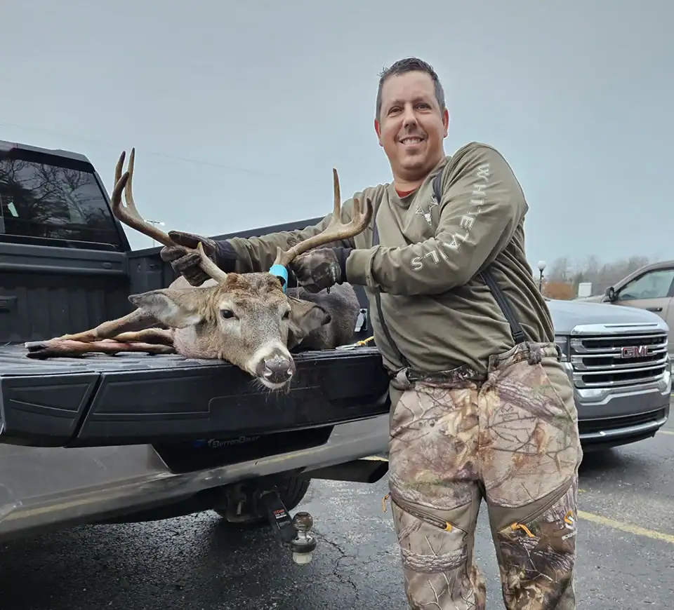 Ryan Bauer of Grayling with his 6-point buck.
